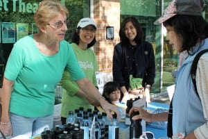 Old women's selling products in event at Summerland, BC