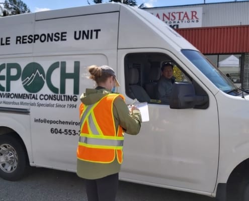 The women volunteer putting entry for driver in Greater Vancouver, BC