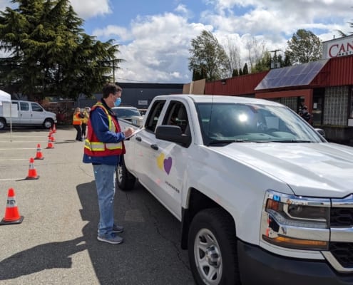 A man putting entry for truck driver in Greater Vancouver, BC