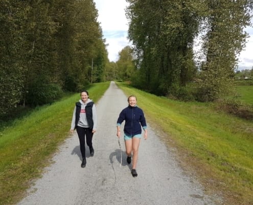 Men walk in the empty road